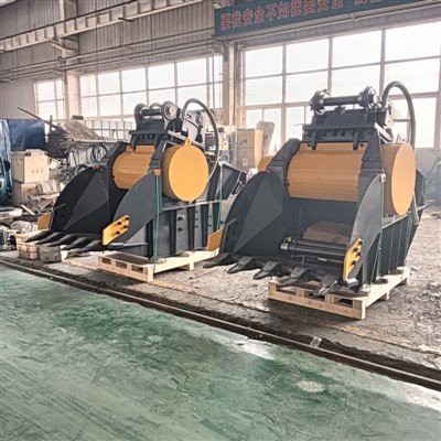 Akmens drupinātāja kauss ekskavatoram